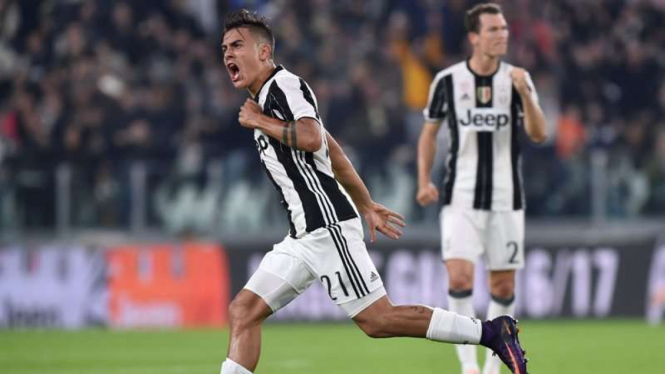 Striker Juventus, Paulo Dybala rayakan gol