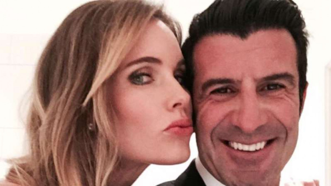 Luis Figo (kanan) dan istrinya Helen Svedin