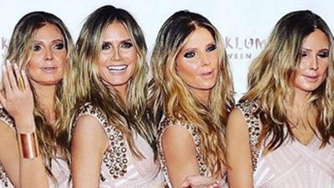 Heidi klum (dua dari kiri) mengenakan kostum Halloween