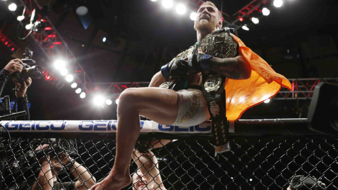 Conor McGregor cetak sejarah di MMA.