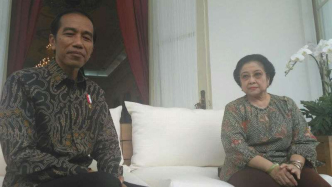 Preside Jokowi bersama Presiden ke-5 Megawati Soekarnoputri di Istana Merdeka.