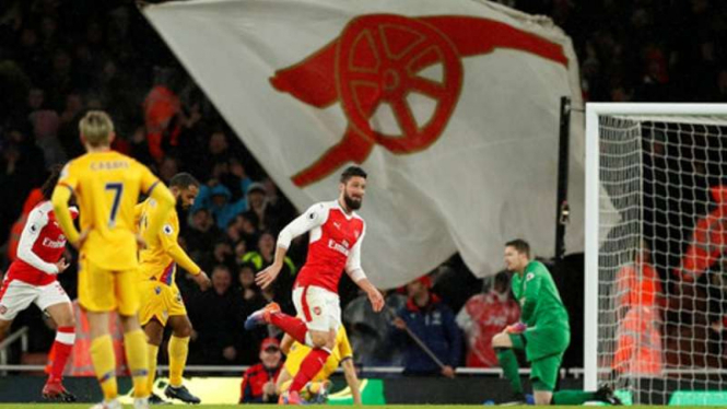 Penyerang Arsenal, Olivier Giroud rayakan gol
