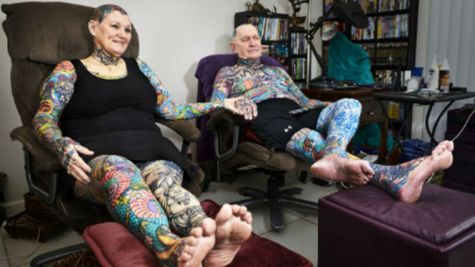Pasangan paling banyak tato, Charlotte Guttenberg dan Charles 'Chuck' Helmke.