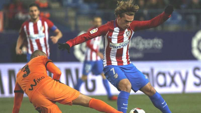 Penyerang Atletico Madrid, Antoine Griezmann (kanan)