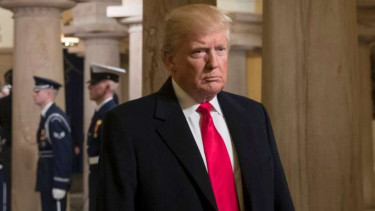 Presiden AS Donald Trump. Kebijakannya dinilai akan membuat guncangan dunia.