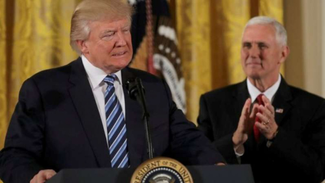 Presiden AS Donald Trump dan Wakil Presiden Mike Pence di Gedung Putih, Washington DC.