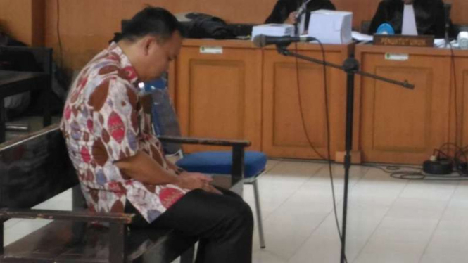 Terdakwa Zulfikar saat menjalani sidang di Pengadilan Negeri Kelas 1 Palembang.