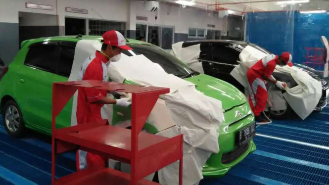 Bengkel perbaikan bodi dan cat Mitsubishi.