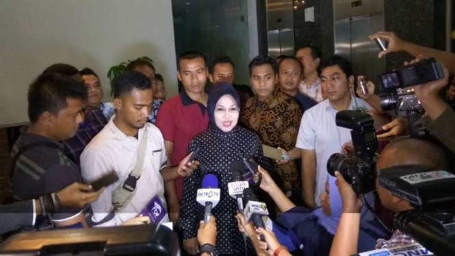 Calon wakil gubernur DKI Jakarta, Sylviana Murni, menjalani pemeriksaan untuk kasus dana hibah Kwartir Daerah Provinsi DKI Jakarta pada 2014 dan 2015.