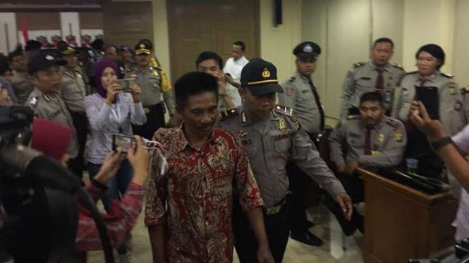 Sahbudin alias Deni ketika tiba di PN Jakarta Utara.
