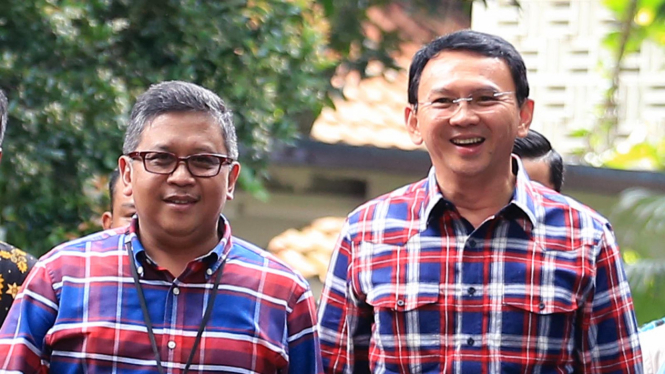 Sekjen PDIP Hasto Kristianto dan Basuki Tjahaja Purnama alias Ahok usai pencoblosan Pilkada DKI 2017.
