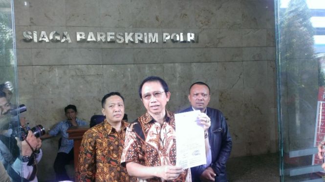 Mantan Ketua DPR Marzuki Ali lapor ke Bareskrim Polri, Jumat (10/3/2017).