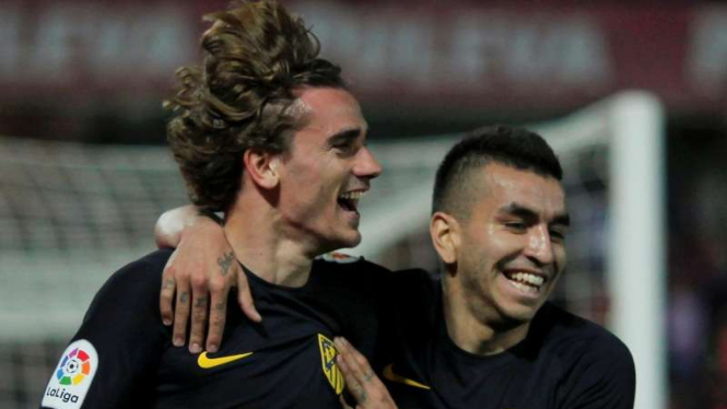 Penyerang Atletico Madrid, Antoine Griezmann (kiri)