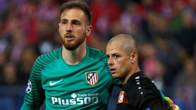 Kiper Atletico Madrid, Jan Oblak (kiri)