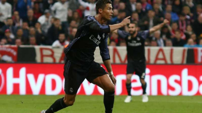 Megabintang Real Madrid, Cristiano Ronaldo, saat rayakan gol.