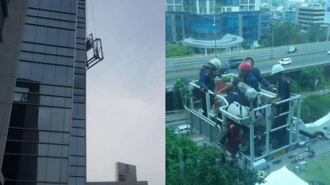 Evakuasi pekerja gondola yang terjebak di lantai lima Gedung Dipo, Jakarta Pusat