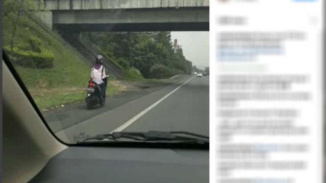 Seorang pengendara motor perempuan diduga melintas Tol Pasteur Bandung Jawa Barat, Senin (29/5/2017)