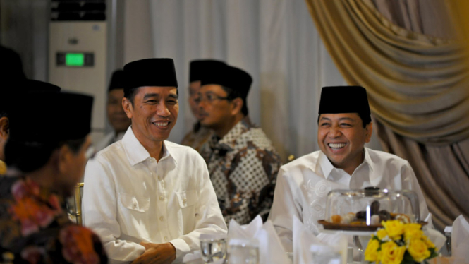 Presiden Joko Widodo dan Ketua DPR RI Setya Novanto dalam acara buka bersama