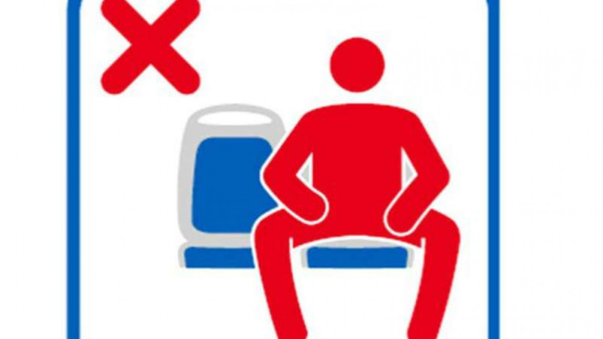Gambar pria dilarang duduk ngangkang dalam angkutan umum di Kota Madrid, Spanyol. 
