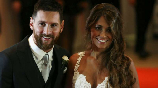 Lionel Messi dan istrinya, Antonella Roccuzzo