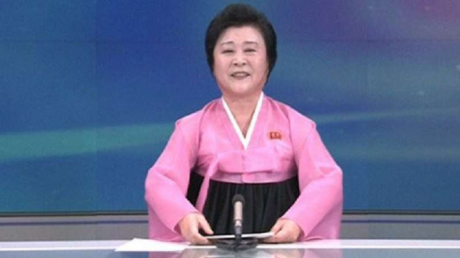 Presenter Korean Central Televisi saat bacakan berita uji coba bom hidrogen.