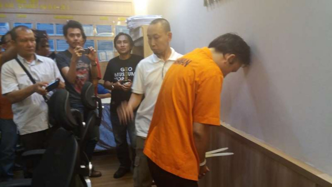 Jonny saat berada di Polda Metro Jaya usai ditangkap di Bogor.