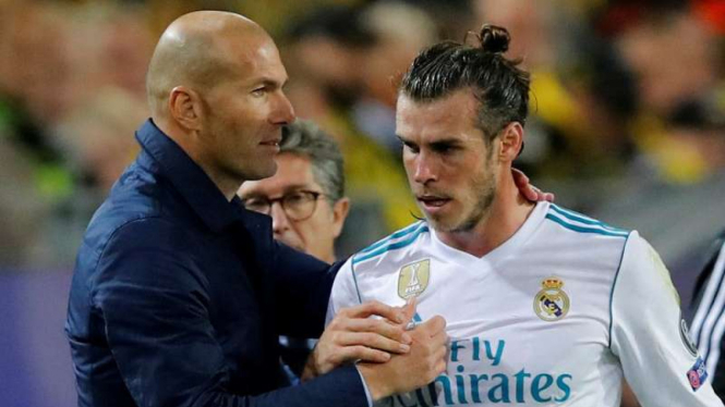 Zinedine Zidane dan Gareth Bale (kanan).