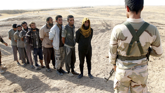 Tentara Kurdi tangkap sekelompok orang yang diduga militan ISIS.