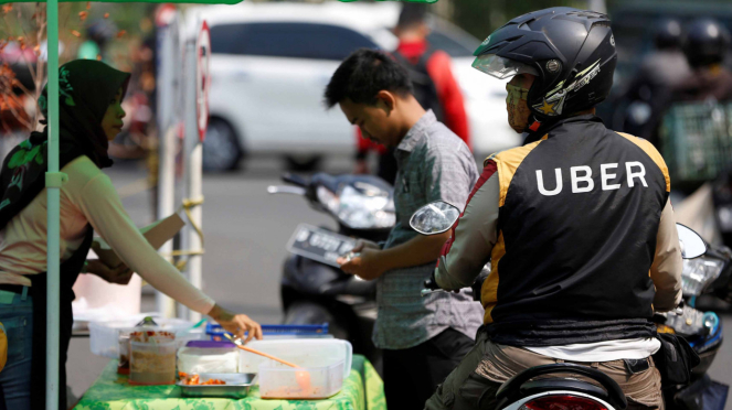 sorot ojek online - transportasi online - ojek uber