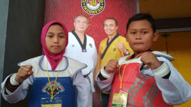 Petarung Taekwondo cilik, Juan Yusuf Firmansyah dan Maulidatun Nada Assyahla.