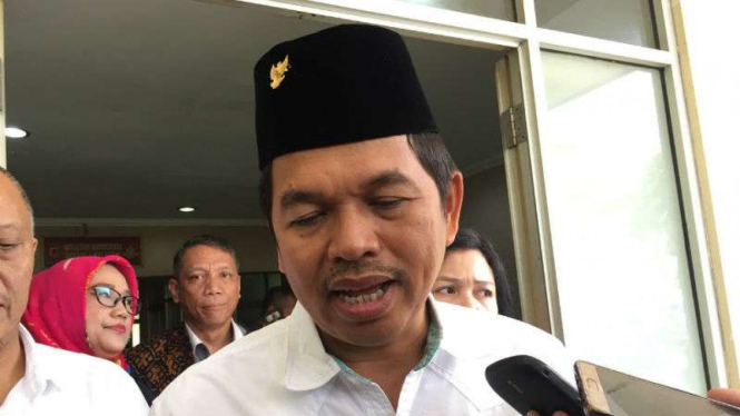 Ketua Partai Golkar Jawa Barat, Dedi Mulyadi, setelah diperiksa penyidik polisi di Markas Polda Jawa Barat di Bandung pada Kamis, 19 Oktober 2017.