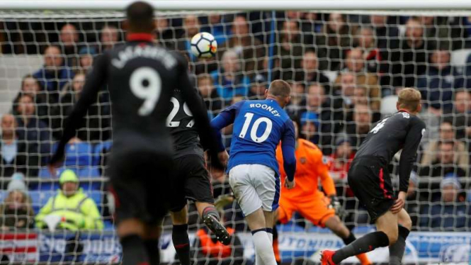 Striker Everton, Wayne Rooney bobol gawang Arsenal