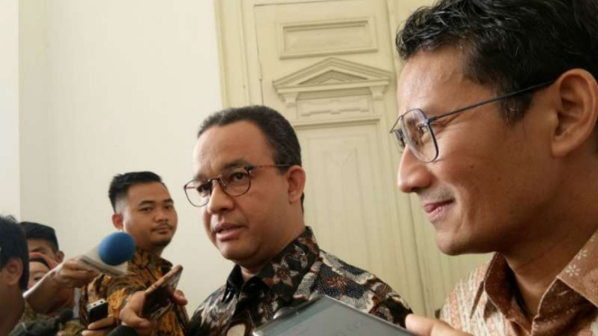 Gubernur DKI Anies Baswedan dan Wakil Gubernur DKI Sandiaga Uno usai bertemu dengan Presiden Joko Widodo.