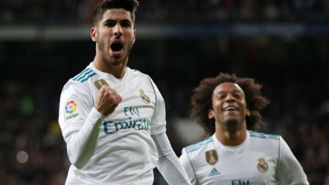 Pemain Real Madrid, Marco Asensio rayakan gol