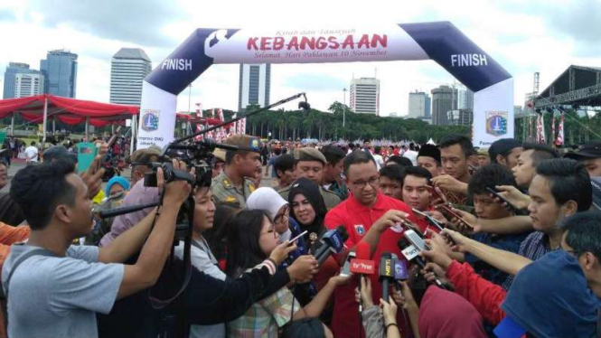 Gubernur DKI Jakarta, Anies Baswedan, di Monas, Minggu, 26 November 2017.