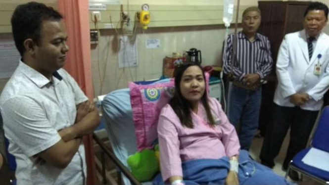Nora Septiani (33), warga asal Kota Palembang yang melahirkan empat bayi kembar, Rabu (6/12/2017)