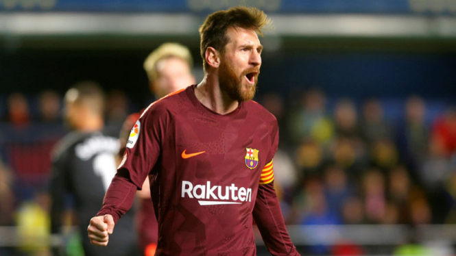 Megabintang Barcelona, Lionel Messi, usai cetak gol ke gawang Villarreal.