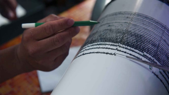 Ilustrasi mesin seismograf membaca gempa.