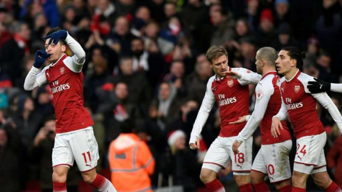 Selebrasi pemain Arsenal usai bobol gawang Newcastle United