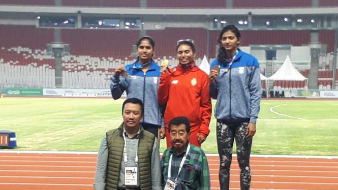 Maria Londa (baju merah) meraih medali emas di Test Event Asian Games 2018