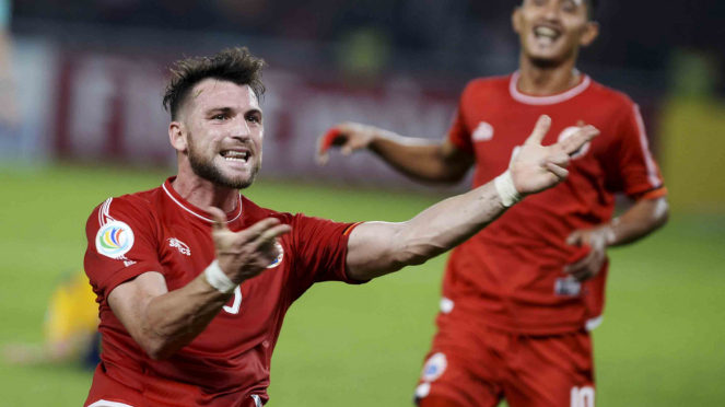 Pemain Persija Jakarta, Marko Simic (kiri) meluapkan kegembiraan usai mencetak gol