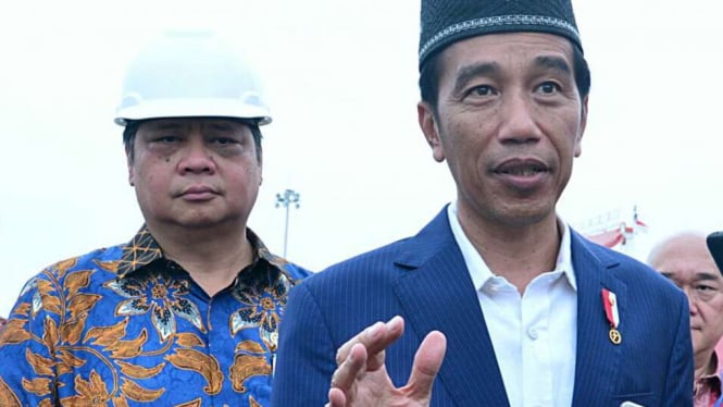 Ketua Umum Partai Golkar Airlangga Hartarto dan Presiden Jokowi.