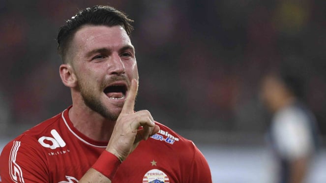 Pemain Persija Jakarta Marko Simic melakukan selebrasi usai mencetak gol