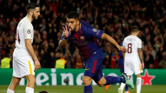 Penyerang Barcelona, Luis Suarez, melakukan selebrasi usai mencetak gol