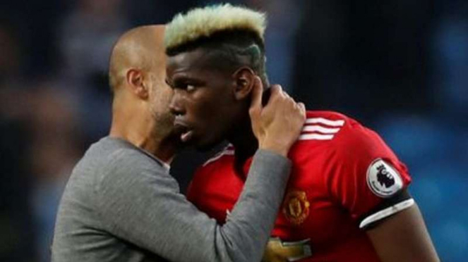 Manajer Manchester City, Pep Guardiola dan Paul Pogba.