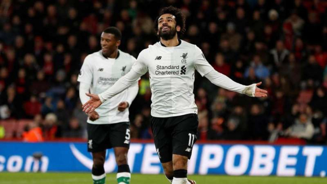 Bintang Liverpool, Mohamed Salah, melakukan selebrasi usai mencetak gol