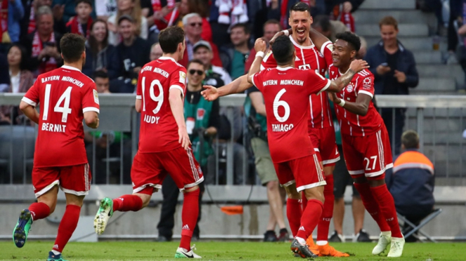 Pemain Bayern Munich merayakan kemenangan.
