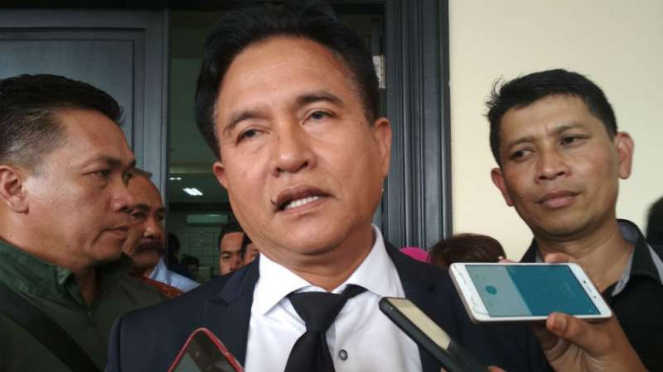 Ketua Umum Partai Bulan Bintang, Yusril Ihza Mahendra, di Pengadilan Tindak Pidana Korupsi Surabaya, Jawa Timur, pada Selasa, 17 April 2018.