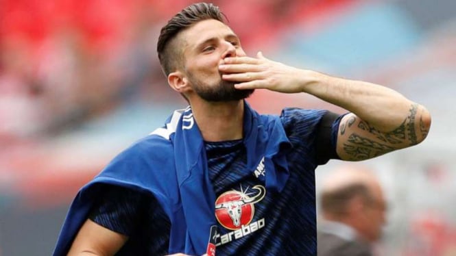 Striker Chelsea, Olivier Giroud, rayakan keberhasilan lolos ke final Piala FA.