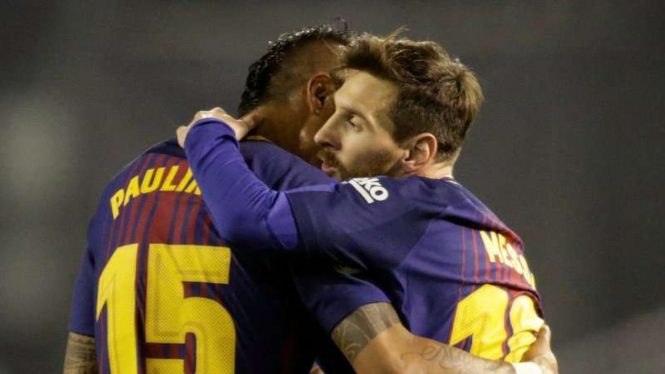Dua bintang Barcelona, Paulinho (kiri) dan Lionel Messi (kanan)